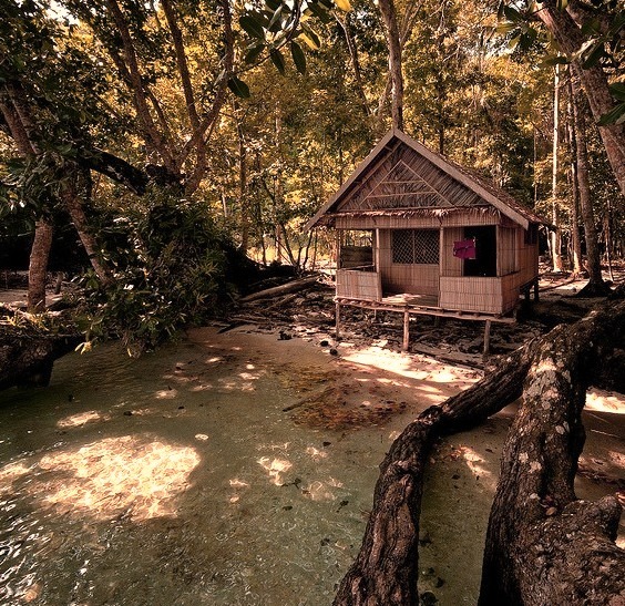 Wooden cabin at the end of Milne Bay, Papua New Guinea